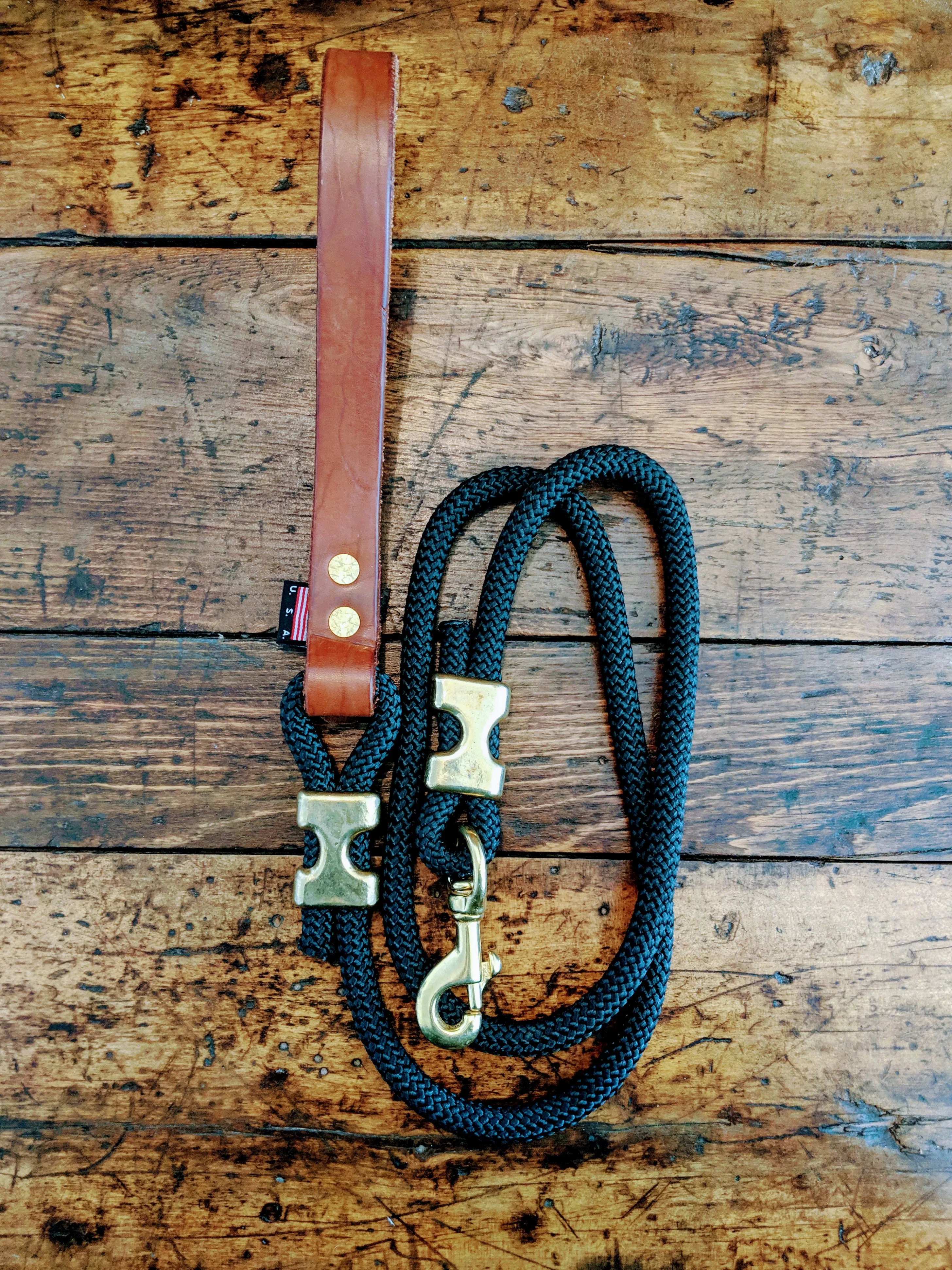 Climbing rope leash with solid brass fittings and custom leather handle