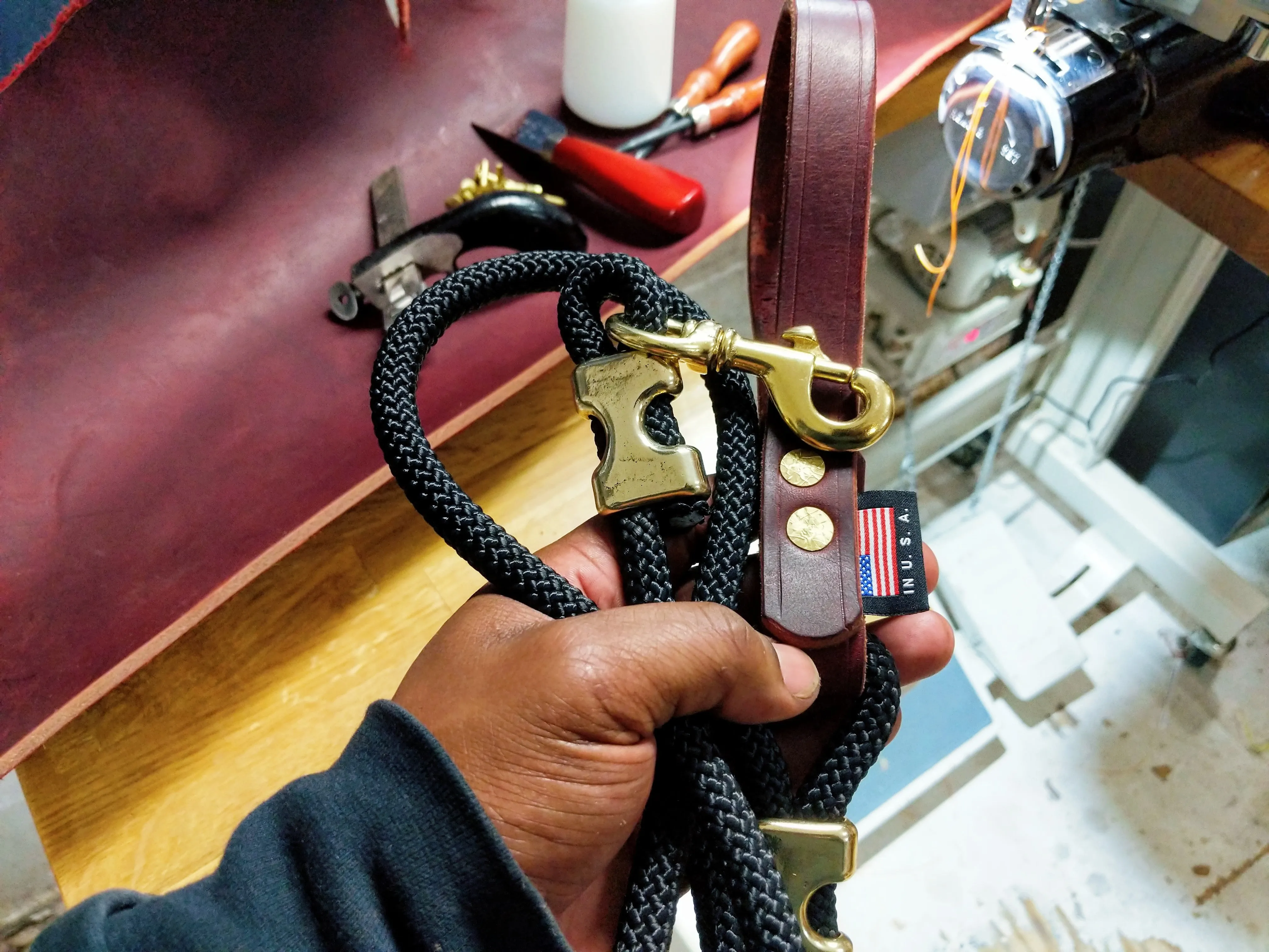 Climbing rope leash with solid brass fittings and custom leather handle