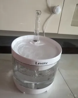 Lesotc pet waterer, cat and dog water dispenser 61OZ/1.8L automatic pet waterer with 3 replacement filters, 1 smart pump, 1 cleaning brush kit, 1 silicone food mat, 1 cat and dog indoor adapter