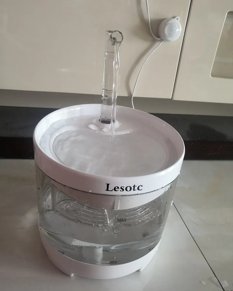 Lesotc pet waterer, cat and dog water dispenser 61OZ/1.8L automatic pet waterer with 3 replacement filters, 1 smart pump, 1 cleaning brush kit, 1 silicone food mat, 1 cat and dog indoor adapter